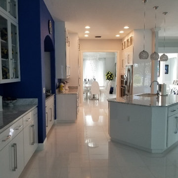 Modern Kitchen Remodel Done in a White Acrylic Glossy Flat Door
