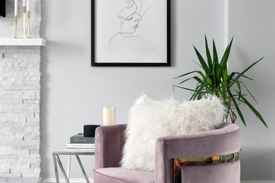 Example of a mid-sized minimalist formal and open concept dark wood floor and brown floor living room design in New York with gray walls, a standard fireplace, a stone fireplace and a media wall