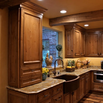 Mediterranean Luxury Kitchen Remodel | Stone Accents & Arched Detailing