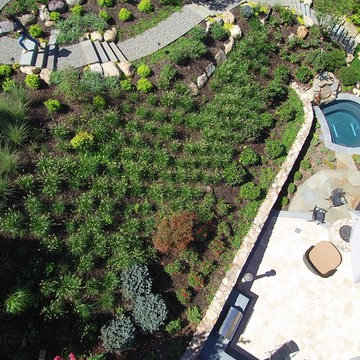 Custom Spa with Slope Landscape