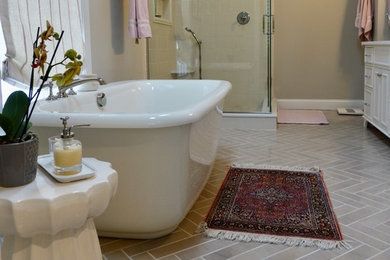 Bathroom - huge traditional master beige tile and marble tile marble floor and gray floor bathroom idea in Cleveland with recessed-panel cabinets, white cabinets, a two-piece toilet, gray walls, an undermount sink, quartz countertops and a hinged shower door
