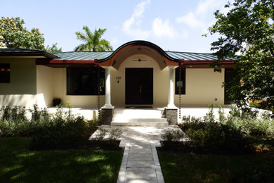 Transitional exterior home idea in Miami