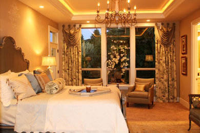 Bedroom - large traditional master carpeted bedroom idea in Portland with beige walls and no fireplace