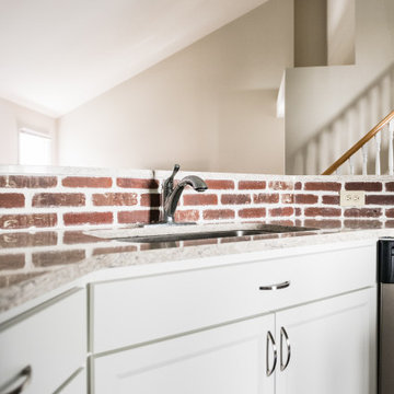 Transitional Kitchen Remodel Done With a Brick Backsplash