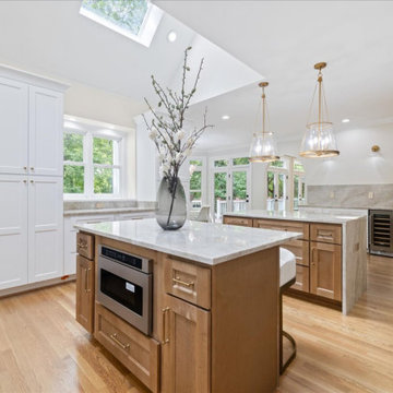 Double-Island Transitional Kitchen with Skylights