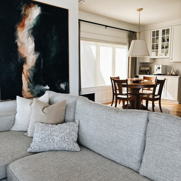 Custom Abstract Artwork in a Warm Modern Living Room — Gorgie Homes
