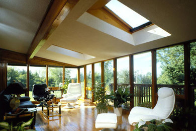 Example of a classic sunroom design in Other