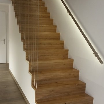 Eichetreppe mit Edelstahlhandlauf