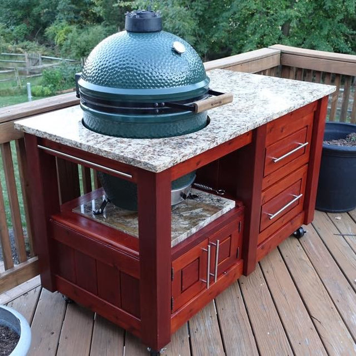 Client requested a cart for a Big Green Egg...so here it is.   Western Red Cedar finished in Mahogany Sikkens stain. Granite top and shelf.