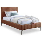 Meridian Furniture - Gallo Vegan Leather Upholstered Bed, Cognac, Twin - Indulge in the comfort and luxury of the Gallo Vegan Leather Twin Bed, and transform your bedroom into a haven of relaxation. This exquisite piece boasts a luscious premium soft cognac vegan leather exterior that exudes elegance and sophistication. Its water-resistant and anti-scratch properties ensure durability and long-lasting beauty. The deep channel tufting adds depth and texture to the overall design, while the sleek black metal legs elevate its character and charm to new heights.