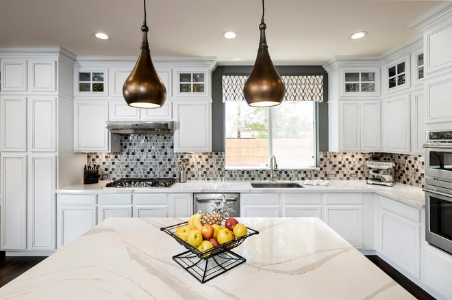 Transitional Kitchen by Room Resolutions