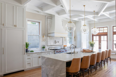 Inspiration for a huge victorian galley medium tone wood floor, brown floor and coffered ceiling eat-in kitchen remodel in San Francisco with an undermount sink, recessed-panel cabinets, white cabinets, quartzite countertops, gray backsplash, marble backsplash, stainless steel appliances, an island and gray countertops