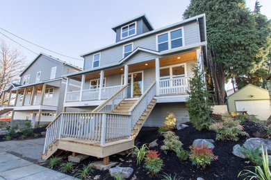 Example of an arts and crafts exterior home design in Portland