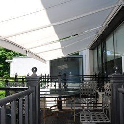 Alutex Cape Code Awnings over gorgeous sliding kitchen doors. - Awnings