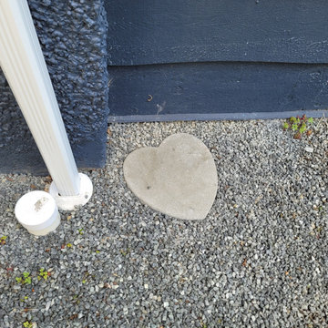 Charcoal on charcoal stamped concrete edging. Victoria BC