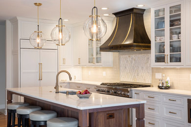 Inspiration for a mid-sized timeless l-shaped medium tone wood floor eat-in kitchen remodel in Cincinnati with an undermount sink, medium tone wood cabinets, quartz countertops, beige backsplash, ceramic backsplash, paneled appliances, an island and white countertops