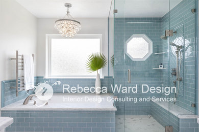Inspiration for a large transitional master blue tile and glass tile porcelain tile and white floor walk-in shower remodel in Sacramento with raised-panel cabinets, white cabinets, an undermount tub, white walls, an undermount sink, marble countertops, a hinged shower door and white countertops
