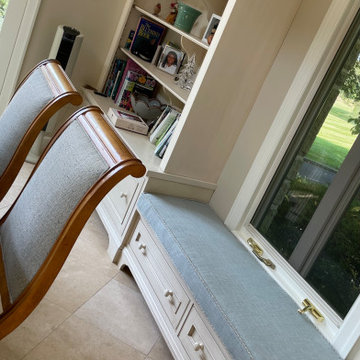 Reupholstered dining chairs with coordinating bench seat cushion