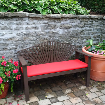 Red cushions revitalize garden benches and chairs