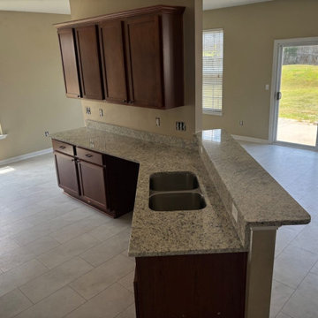 Speckled granite kitchen peninsula
