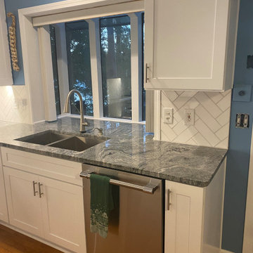 JOAN C KITCHEN, COUNTERTOPS AND CABINETS