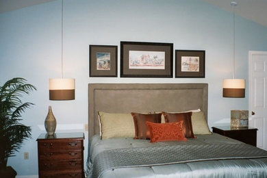 Large elegant master carpeted bedroom photo in Philadelphia with blue walls and no fireplace
