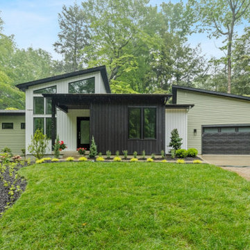 Almost Heaven: Custom Modern Home on a Wooded Lakeshore Site