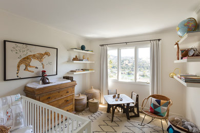 Design ideas for a mid-sized eclectic nursery in San Francisco with beige floor.