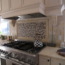 BEHIND STOVE