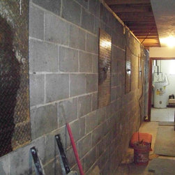 Foundation repair, Basement was caving in. Pulled back to plumb - Products