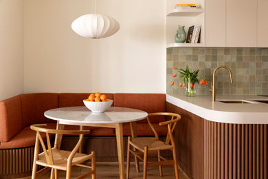 Photo of a midcentury dining room in Melbourne.