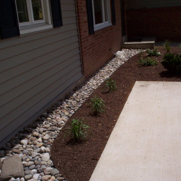 Silver Spring foundation planting and dry creek bed