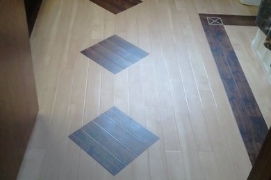 Example of a mid-sized transitional master brown tile linoleum floor bathroom design in Other with a one-piece toilet