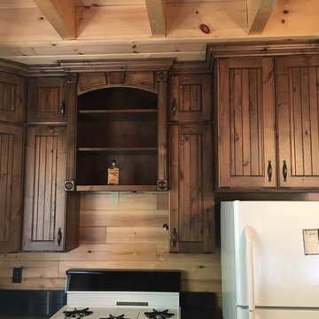 Rustic Alder (Knotty) Raised Panel Cabinets w/1/2" Scoop & Vgroove Panel