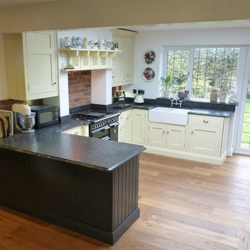 1909 in-frame charcoal and ivory kitchen, leathered steel grey granite worktops