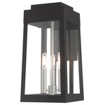 Livex Lighting - Livex Lighting Black 3-Light Outdoor Wall Lantern - This updated industrial design comes in a tapering solid brass black frame with a sleek, straight-lined look. Clear glass panels offer a full view of the brushed nickel accents, that will house the bulb of your choice.