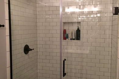 Mid-sized urban 3/4 white tile and subway tile ceramic tile and white floor alcove shower photo in Chicago with gray walls, a two-piece toilet and a hinged shower door