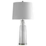 StyleCraft Home Collection - Clear Seeded Glass Table Lamp - This table lamp has a clear seeded glass frame with a striking brass steel base and matching accents. The white hardback fabric shade diffuses light from the incandescent bulb, making the metallic accents gleam. Display this beautiful glass table lamp in any room, from a hallway or office to a bedroom, dining room, or living room.