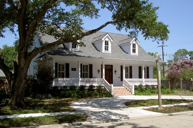 Example of a classic white two-story mixed siding exterior home design in New Orleans