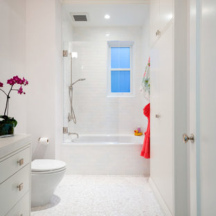 Inspiration for a contemporary white tile and subway tile mosaic tile floor and white floor bathroom remodel in San Francisco with flat-panel cabinets and white cabinets