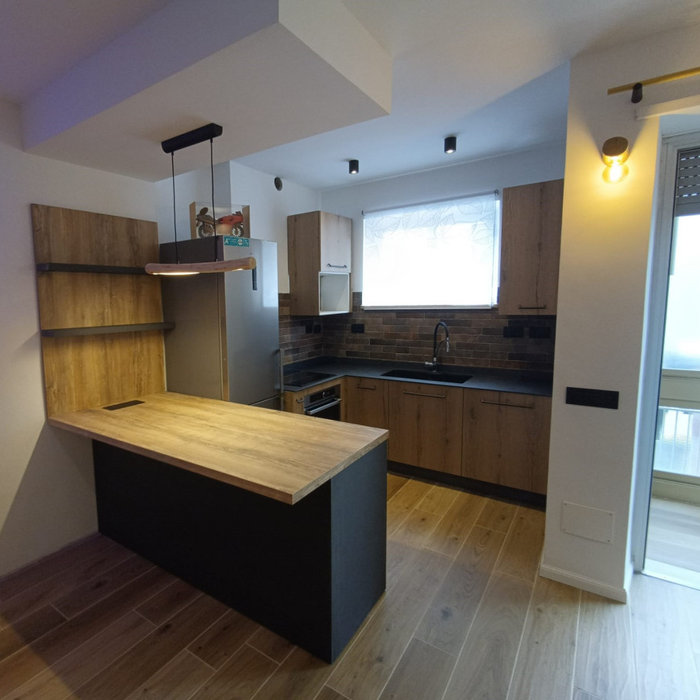 Per la Cucina: Anta finitura Quercia Vecchia con maniglia antracite, Top HPL color Pietra Nera con lavello 1 vascone in Keratek Nero sottotop