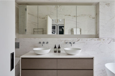 Design ideas for a large contemporary bathroom in London with flat-panel cabinets, grey cabinets, white tiles, marble tiles, marble flooring, a vessel sink, multi-coloured worktops, double sinks and a floating vanity unit.