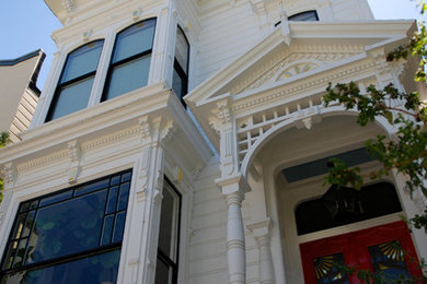 Example of a transitional white two-story wood exterior home design in San Francisco