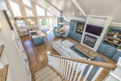 Beach style living room photo in Other