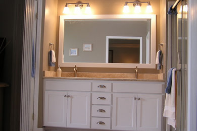 Example of a mid-sized classic master ceramic tile and beige floor bathroom design in Kansas City with shaker cabinets, white cabinets, beige walls and an undermount sink