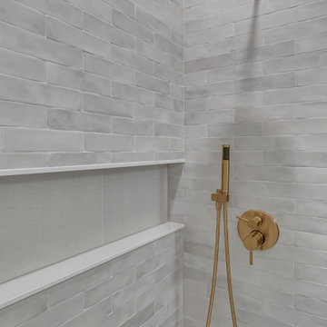 White Bathroom With Golden Finishes