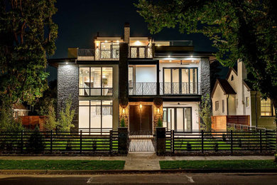 デンバーにあるラグジュアリーなコンテンポラリースタイルのおしゃれな家の外観 (漆喰サイディング) の写真
