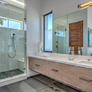 Example of a large minimalist master porcelain floor bathroom design in Los Angeles with flat-panel cabinets, medium tone wood cabinets, beige walls and an undermount sink