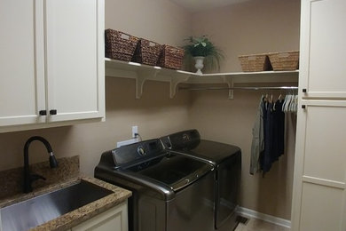 This is an example of a small transitional l-shaped dedicated laundry room in Denver with an undermount sink, shaker cabinets, white cabinets, granite benchtops, beige walls and a side-by-side washer and dryer.