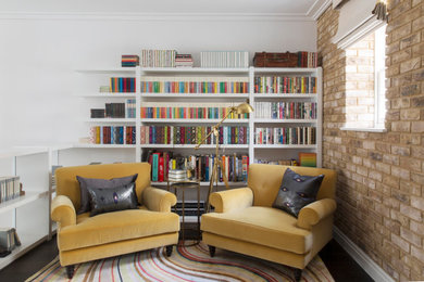 Design ideas for a medium sized contemporary games room in London with a reading nook, white walls and brown floors.